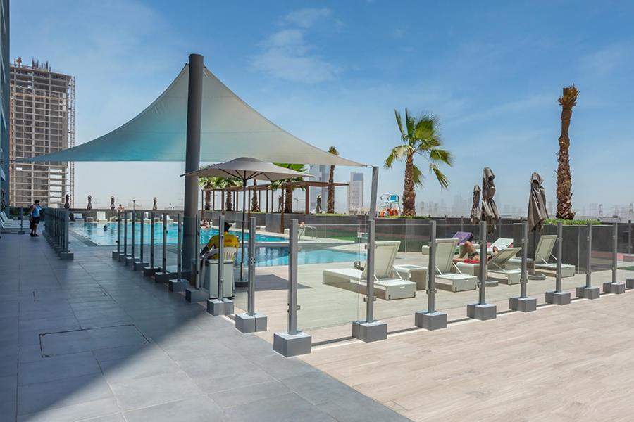 Apartamento Bloom Height Tower Dubái Exterior foto